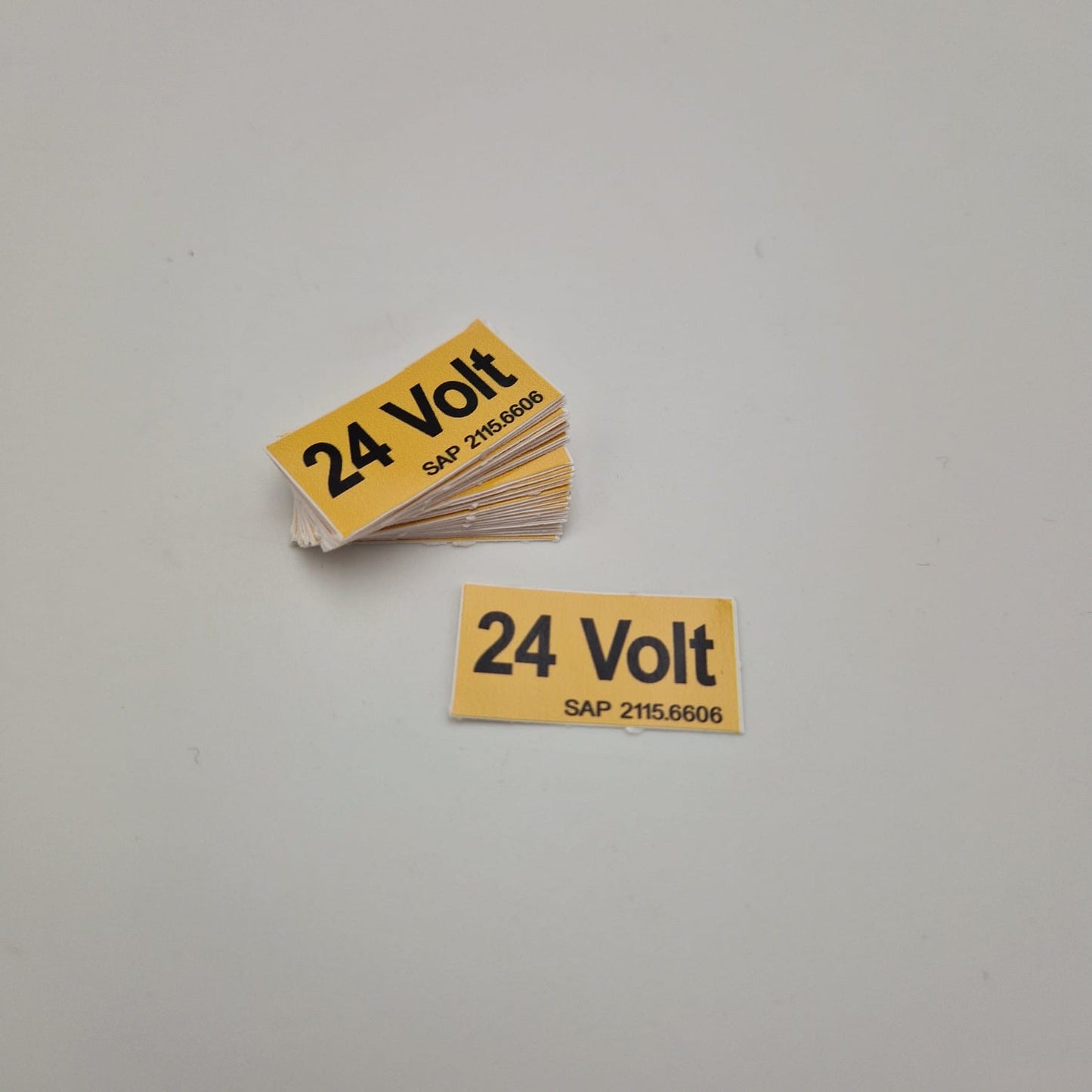 SELBSTKLEBE-ETIKETTE 30X17MM 24 VOLT