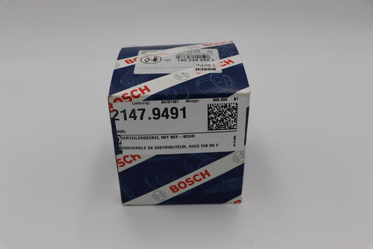 DISTRIBUTOR COVER WITH FASTENING SCREW A0001584802